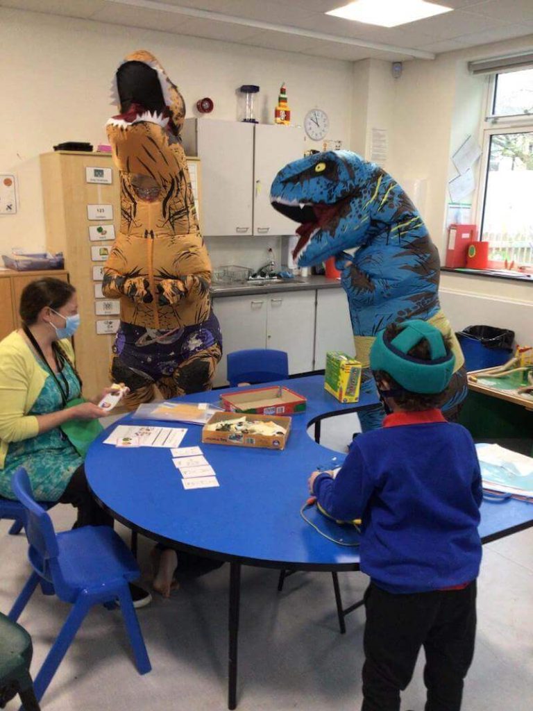 dinosaur visiting classroom