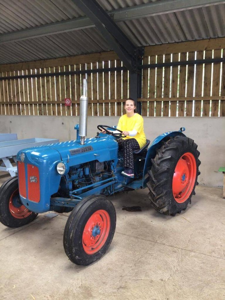 student on tractor