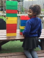 student playing with blocks